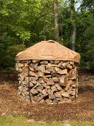 6ft diameter round stack of firewood neatly stacked with a cordwood cover